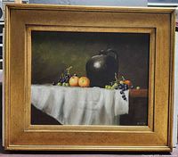 Full view of framed oil painting showing artwork and frame