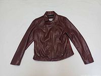 Front view of burgundy leather jacket