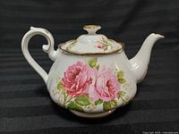 Side view showing rose pattern and spout