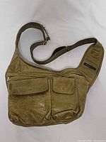 Front view showing dual flap pockets and overall shape