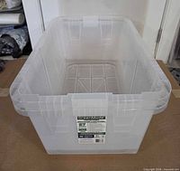 Top view of one clear GreenMade tote showing interior and label