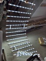 Full view of foldable LED strip panel illuminated on floor