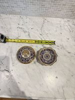 Top views of lid and compote with measuring tape