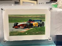 Front view of framed Formula 1 Lola photographic print
