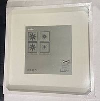 Front view of sealed RIBBA frame showing label and mat