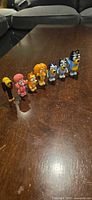 All seven Bluey figures on tabletop