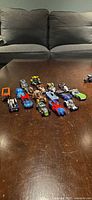 All 17 Hot Wheels cars arranged on table