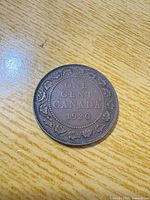 Reverse of 1920 Canada one-cent showing denomination, date, maple leaf wreath