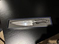 Knife in presentation box showing full blade and handle