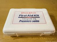 Front view of sealed Johnson & Johnson first aid kit