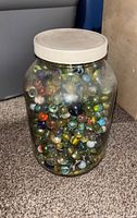 Full jar showing marbles and lid