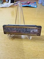 Front view showing Marine Band logo and general wear