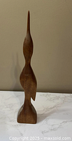full front view of the abstract wooden bird sculpture