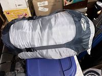 Sleeping bag in compression sack side view