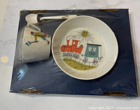 Entire set shrink-wrapped on board showing bowl, cup and spoon