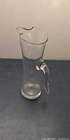Full view of clear glass martini pitcher