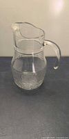 Full view of clear glass pitcher