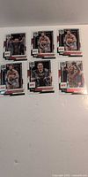 Six UFC Donruss trading cards laid out