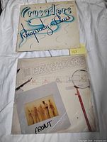 Front covers of both albums