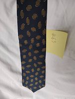 Full length view of tie front displaying pattern and overall condition