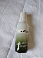 Front view of La Mer Hydrating Infused Emulsion bottle showing branding
