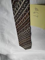Front view of full tie showing pattern and blade shape