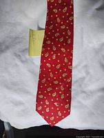 Front view of red paisley tie