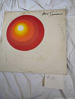 Front sleeve with concentric circle artwork and Nina Simone signature