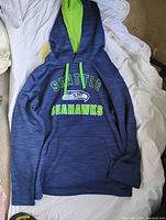 Full view of blue Seattle Seahawks hoodie front side