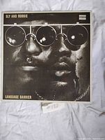 Front cover showing title and Black Swan sticker