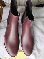 Top view showing both burgundy boots