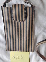 Front view showing striped pattern and flap