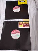 Top view showing two Strictly Rhythm 12" singles in black sleeves