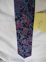 Full front view of paisley necktie