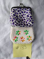 Both coin purses front view showing patterns and closures