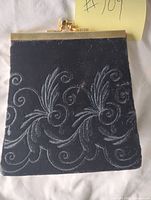 Front view showing embroidered scroll design