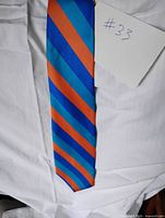 Full view of tie showing pattern and colours