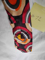 Front view showing geometric concentric circle pattern and colours