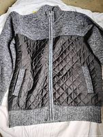 Full view of the front of jacket laid flat