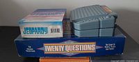 Twenty Questions, Jeopardy boxes and Battleship unit stacked
