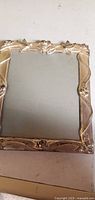 silver-tone ornate floral metal-cover wedding album front