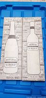 Front view showing both wine bottle canvas panels