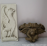Both decorative plaster pieces side by side