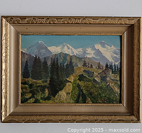 Framed oil painting on wall