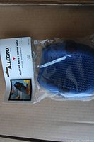 Front of sealed Allegro 7101 blue knee/elbow pads package