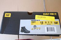 Box showing model, size, and branding