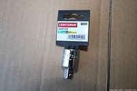 Front view of Craftsman adapter on card