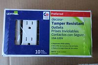 Front of sealed Leviton Decora 10-pack box