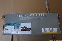 Retail box front with product label showing brand, model, size