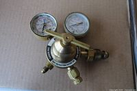 Top view showing complete regulator with gauges and fittings